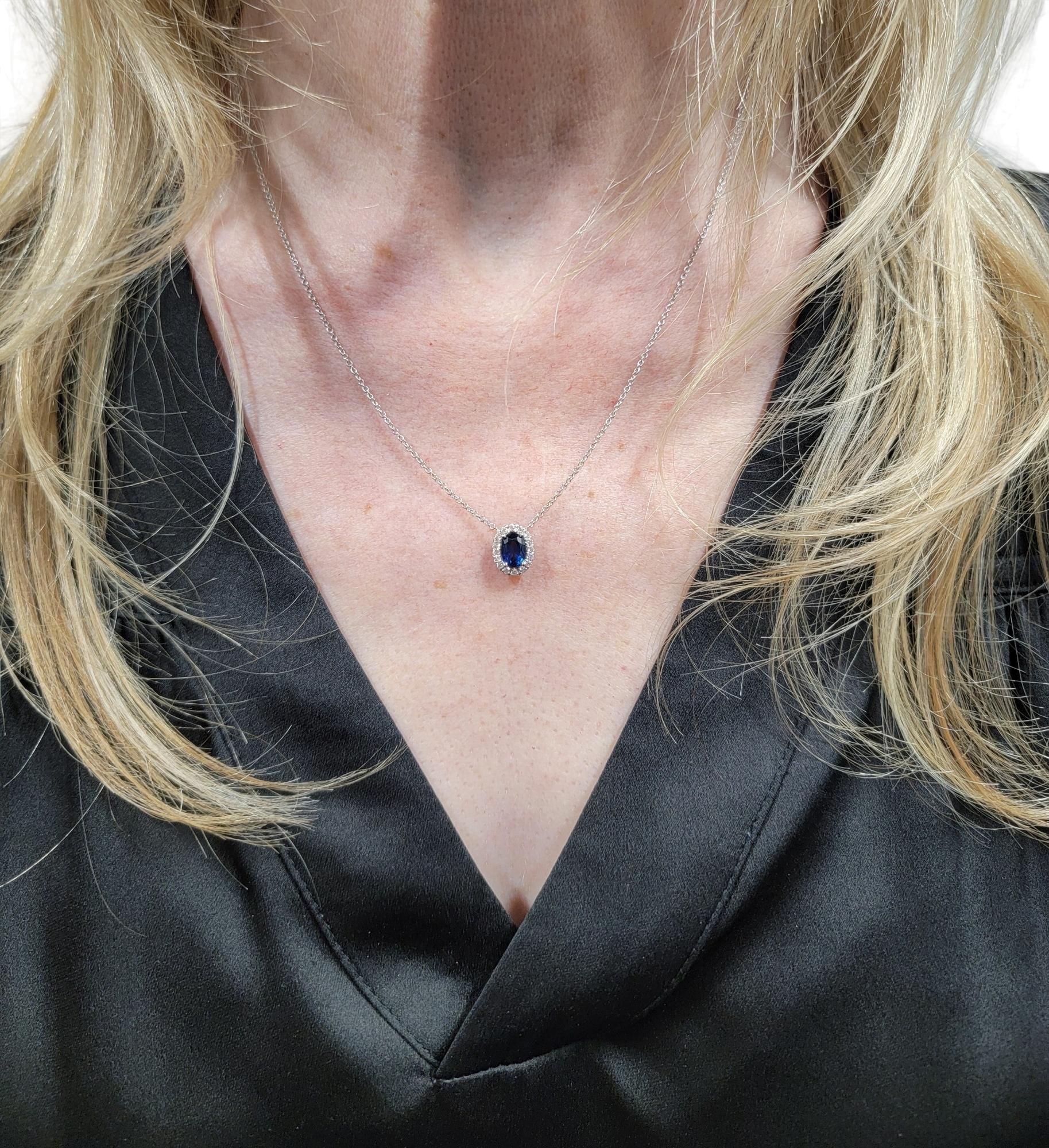 Oval Cut Blue Sapphire and Diamond Halo Pendant Necklace in 18 Karat White Gold For Sale 6