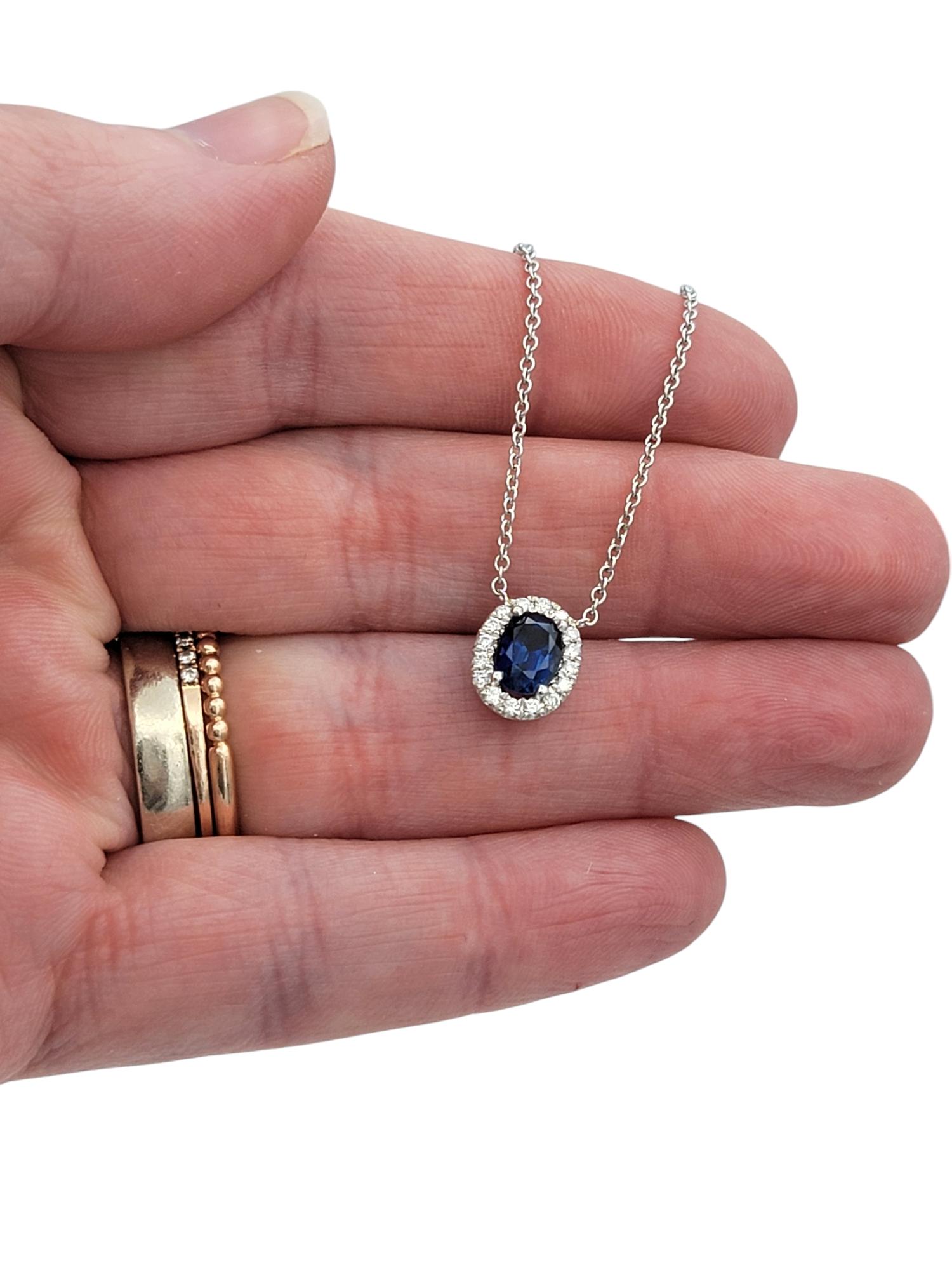 Oval Cut Blue Sapphire and Diamond Halo Pendant Necklace in 18 Karat White Gold For Sale 4