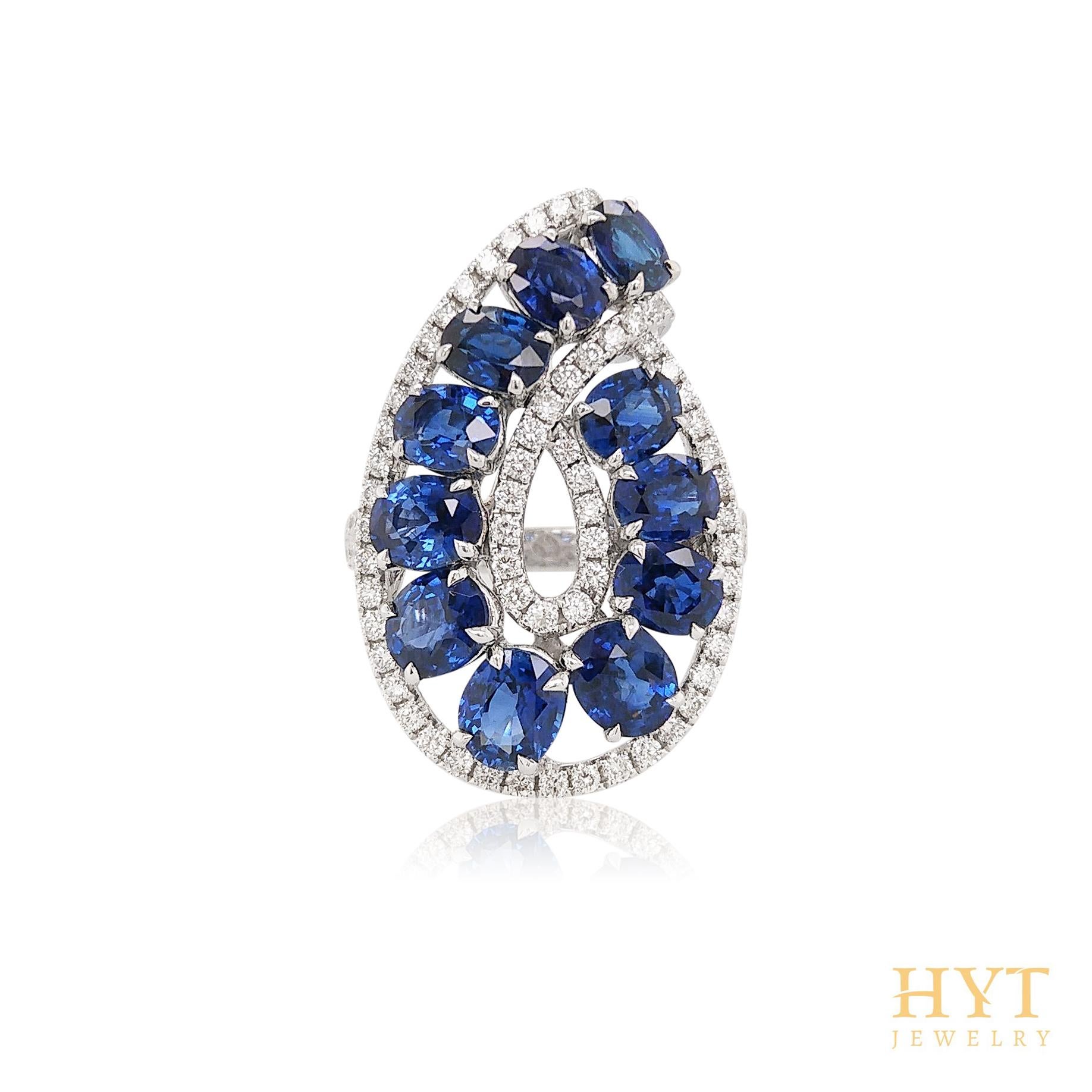 A captivating 18K gold ring showcasing striking blue sapphires accented with shimmering white diamonds. Designed for maximum impact, this eye-catching piece is perfect for making a glamorous statement.

Oval cut Blue Sapphire- 6.05 cts
Round