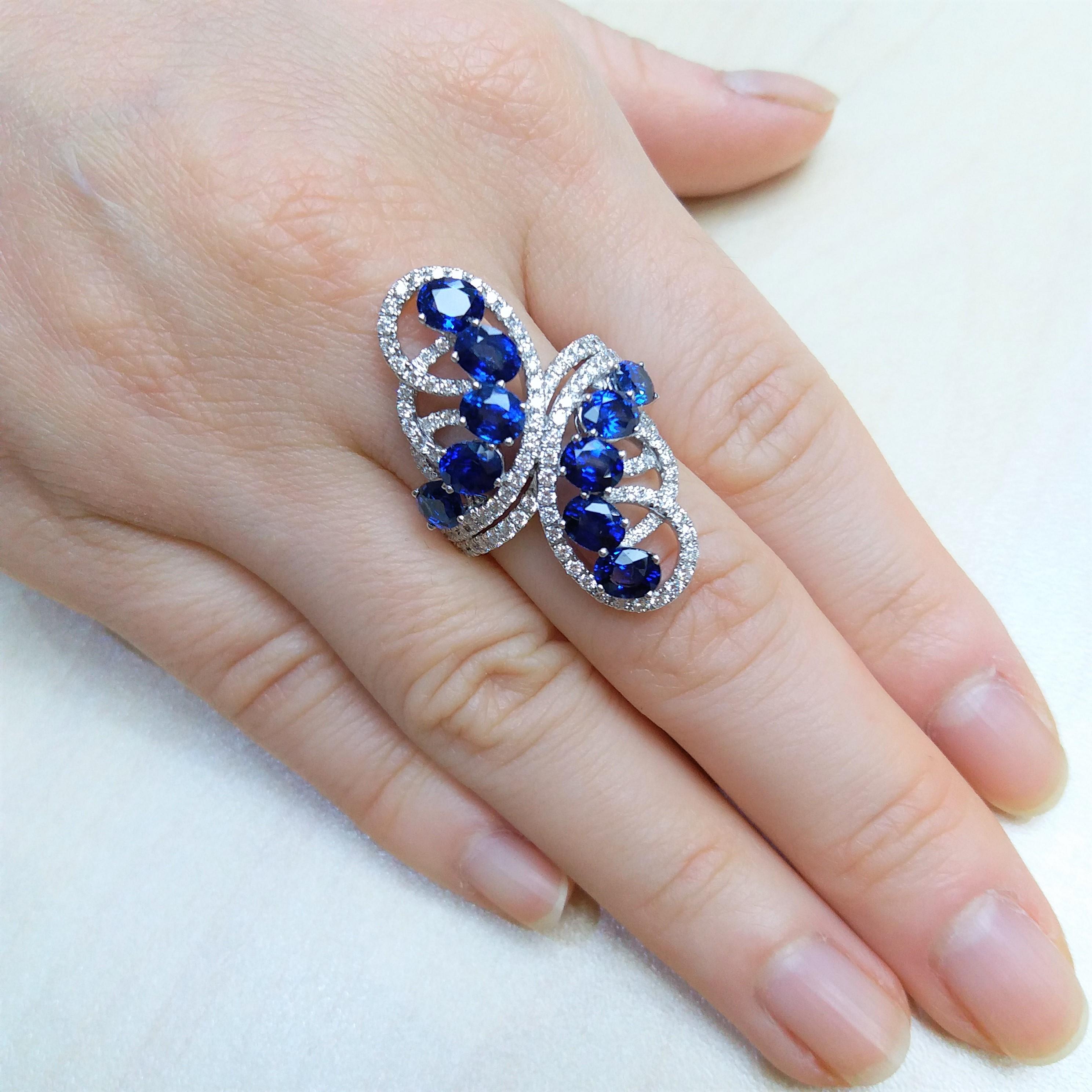 Oval Cut Oval cut Blue Sapphire and Round cut white diamonds, 18K Gold Cocktail Ring For Sale