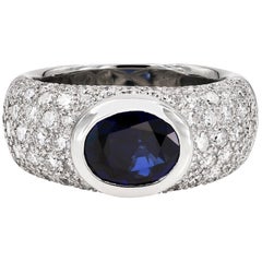 Oval Cut Blue Sapphire and Round Diamond Ring in Platinum