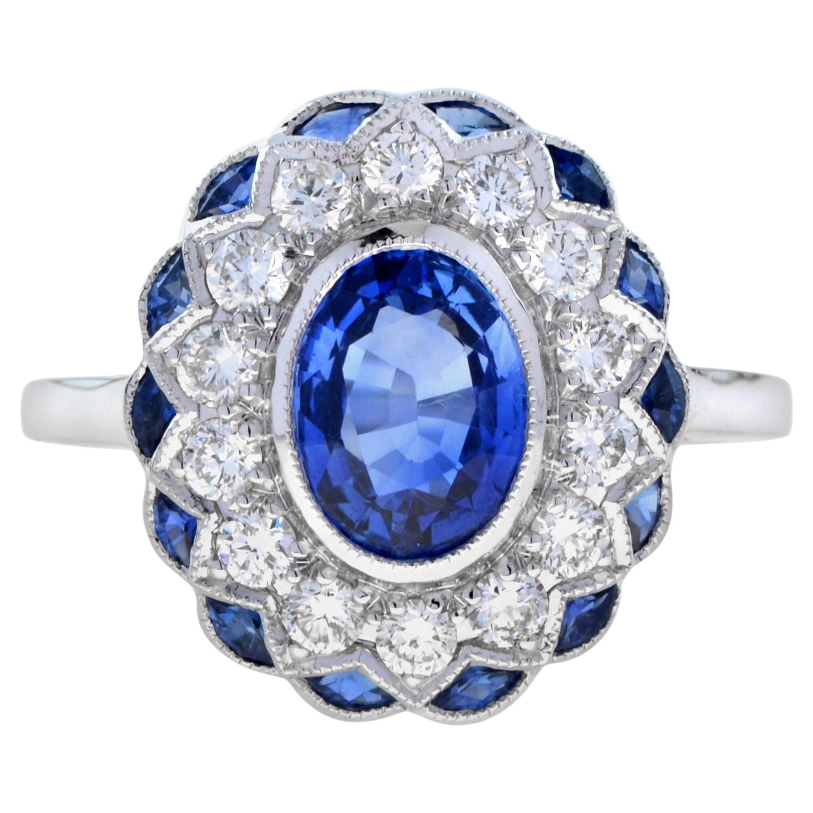 Anello con zaffiro blu taglio ovale e diamante in stile Art Deco con incastonatura a raggiera in oro bianco 18 carati