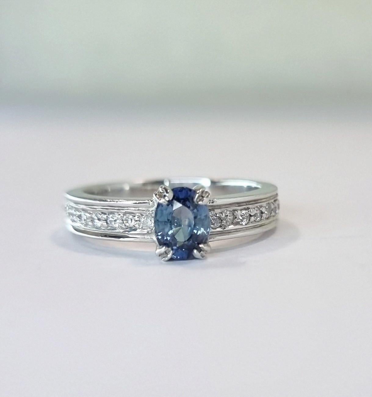 Oval-Cut Blue Sapphire Engagement Ring with Natural Zircon Accents For Sale 4