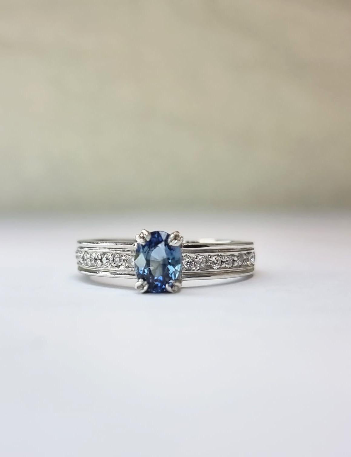 Oval-Cut Blue Sapphire Engagement Ring with Natural Zircon Accents For Sale 5