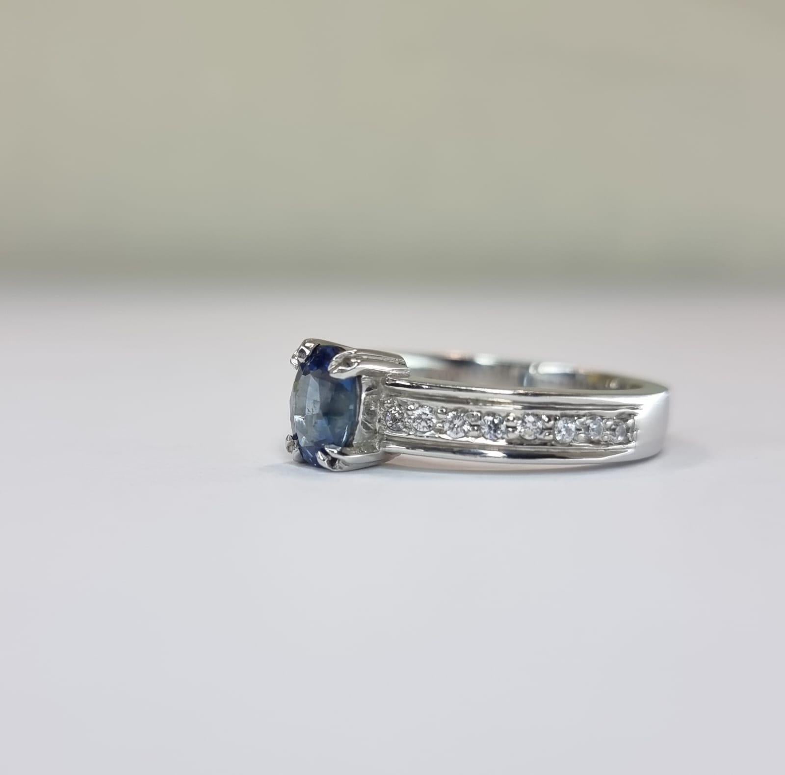 Oval-Cut Blue Sapphire Engagement Ring with Natural Zircon Accents For Sale 8