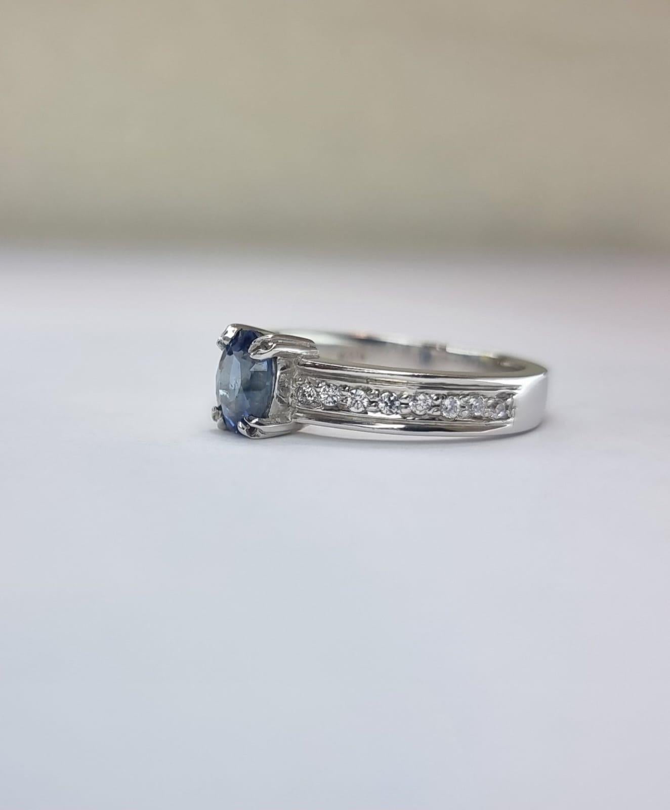 Oval-Cut Blue Sapphire Engagement Ring with Natural Zircon Accents For Sale 10