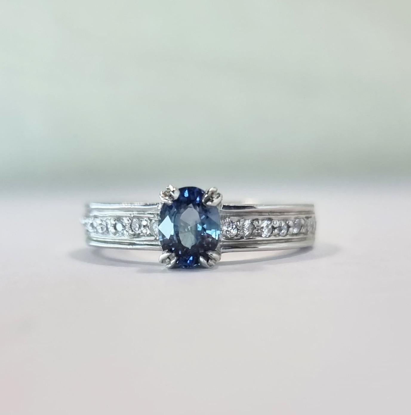 Oval-Cut Blue Sapphire Engagement Ring with Natural Zircon Accents For Sale 11