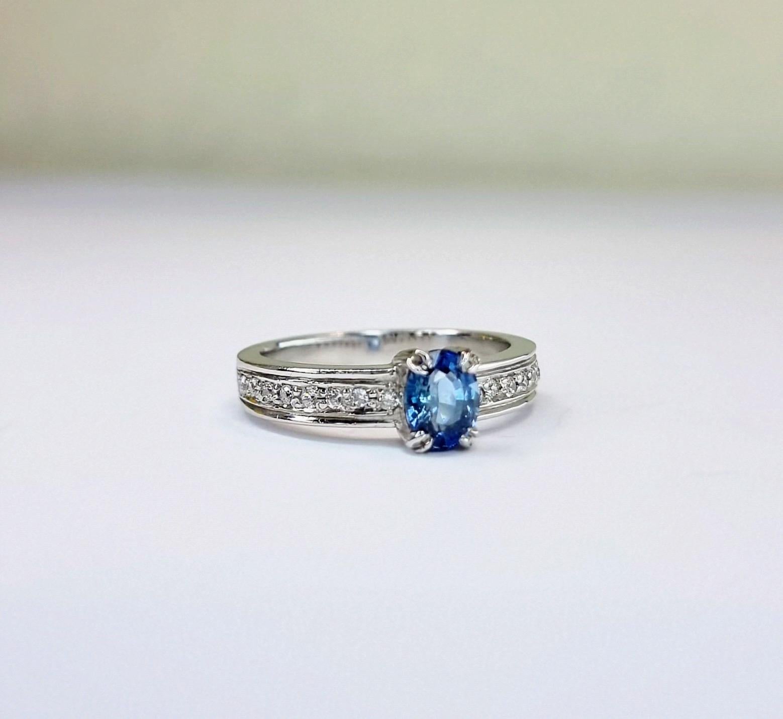 Oval-Cut Blue Sapphire Engagement Ring with Natural Zircon Accents For Sale 12