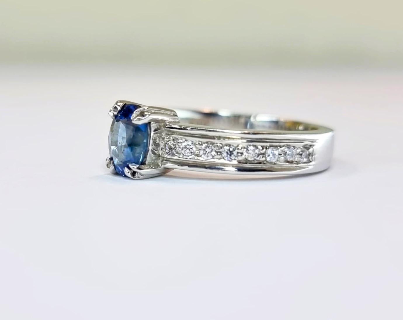 Oval-Cut Blue Sapphire Engagement Ring with Natural Zircon Accents For Sale 2