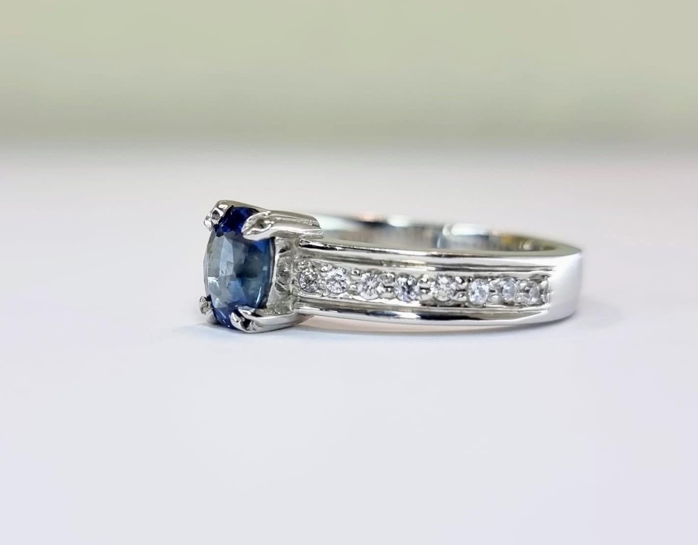 Oval-Cut Blue Sapphire Engagement Ring with Natural Zircon Accents For Sale 3
