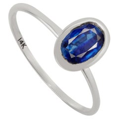 Oval Cut Blue Sapphire Solitaire Ring in Bezel Set 14K White Gold Fine Jewelry