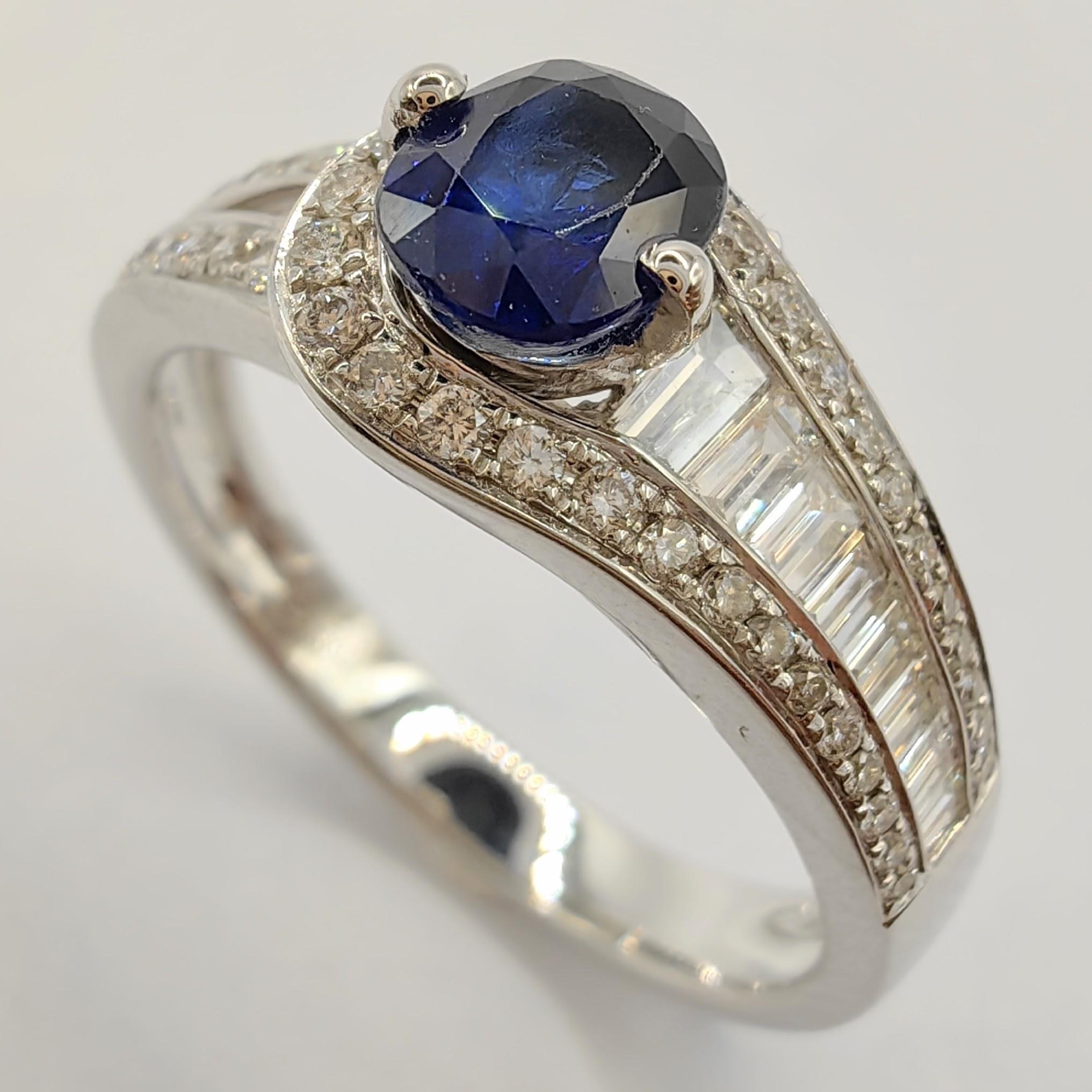 Contemporary Oval-Cut Blue Sapphire Tapered Baguette Diamond Ring in 18k White Gold For Sale