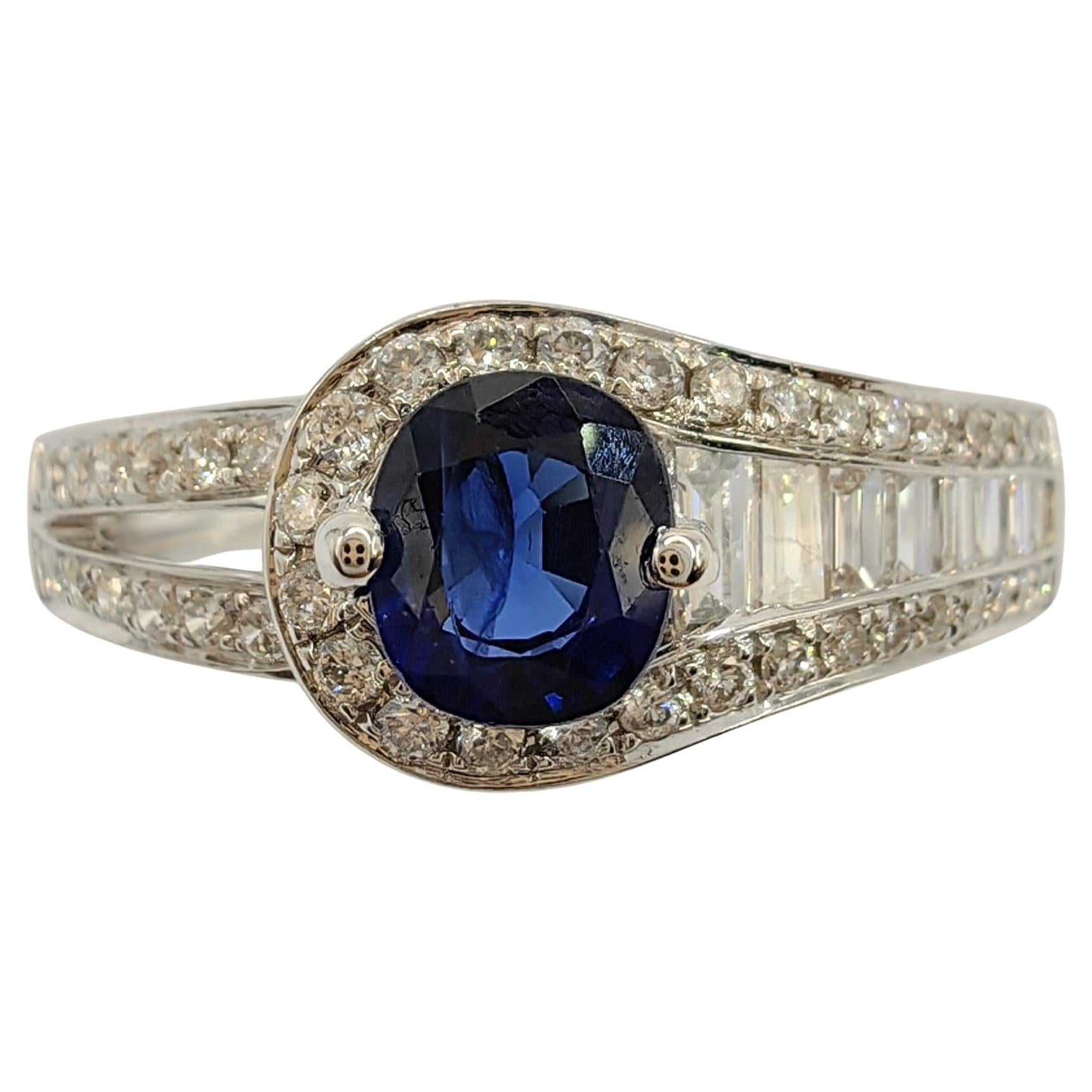 Oval-Cut Blue Sapphire Tapered Baguette Diamond Ring in 18k White Gold For Sale