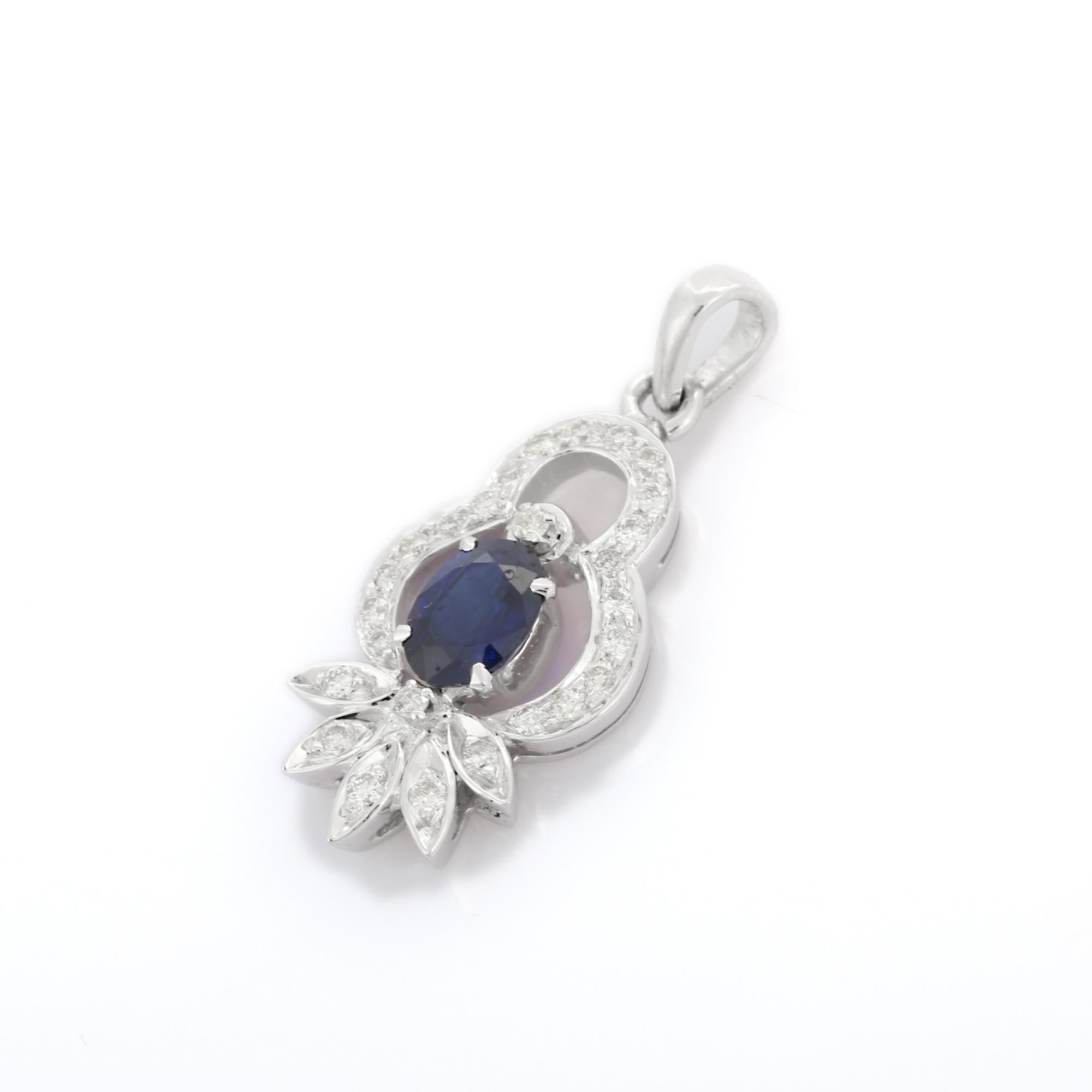 Blue Sapphire pendant in 18K Gold. It has a oval cut sapphire studded with diamonds that completes your look with a decent touch. Pendants are used to wear or gifted to represent love and promises. It's an attractive jewelry piece that goes with