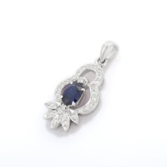 Ovale  Ciondolo con zaffiro blu e diamante in oro bianco 18K
