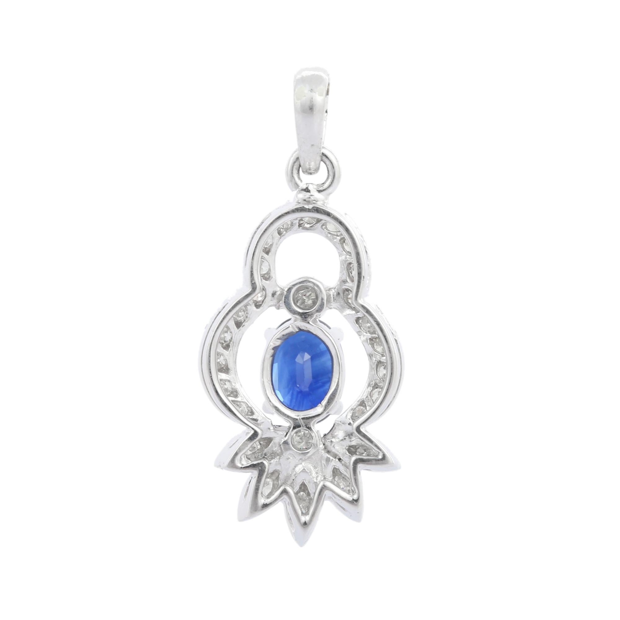 Oval Cut Oval  Blue Sapphire and Diamond Designer Charm Pendant in 18K White Gold For Sale