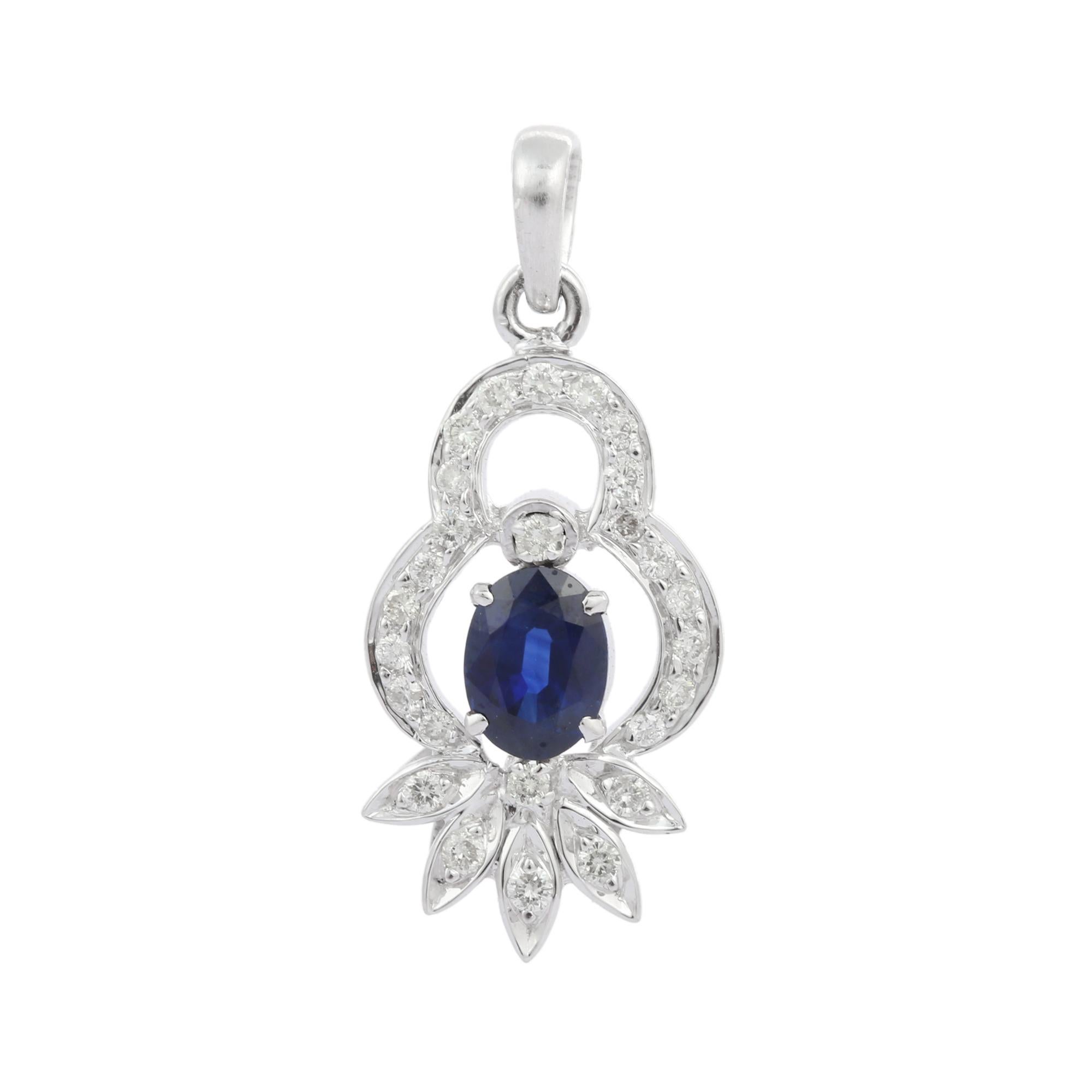 Oval  Blue Sapphire and Diamond Designer Charm Pendant in 18K White Gold In New Condition For Sale In Houston, TX