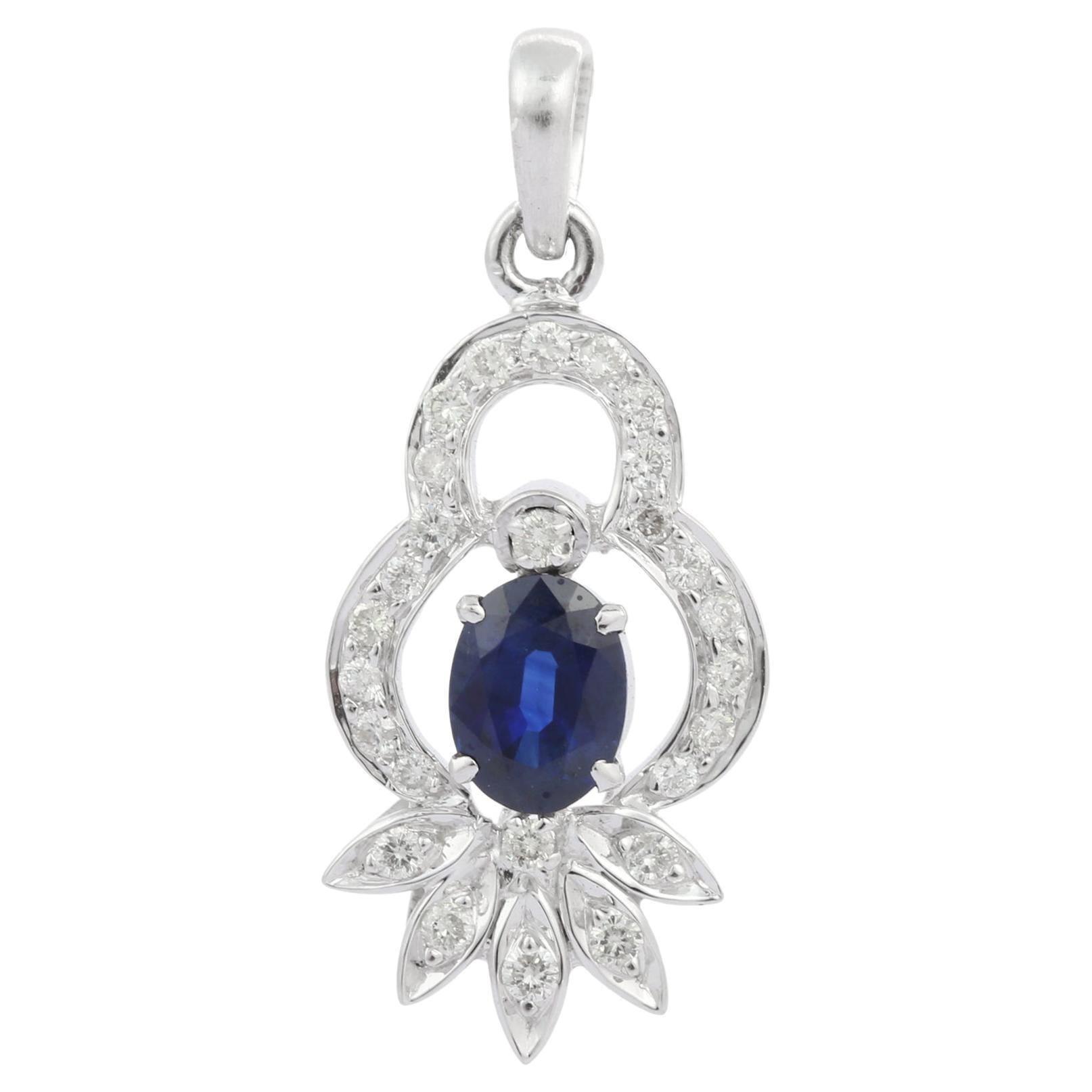 Oval  Blue Sapphire and Diamond Designer Charm Pendant in 18K White Gold For Sale