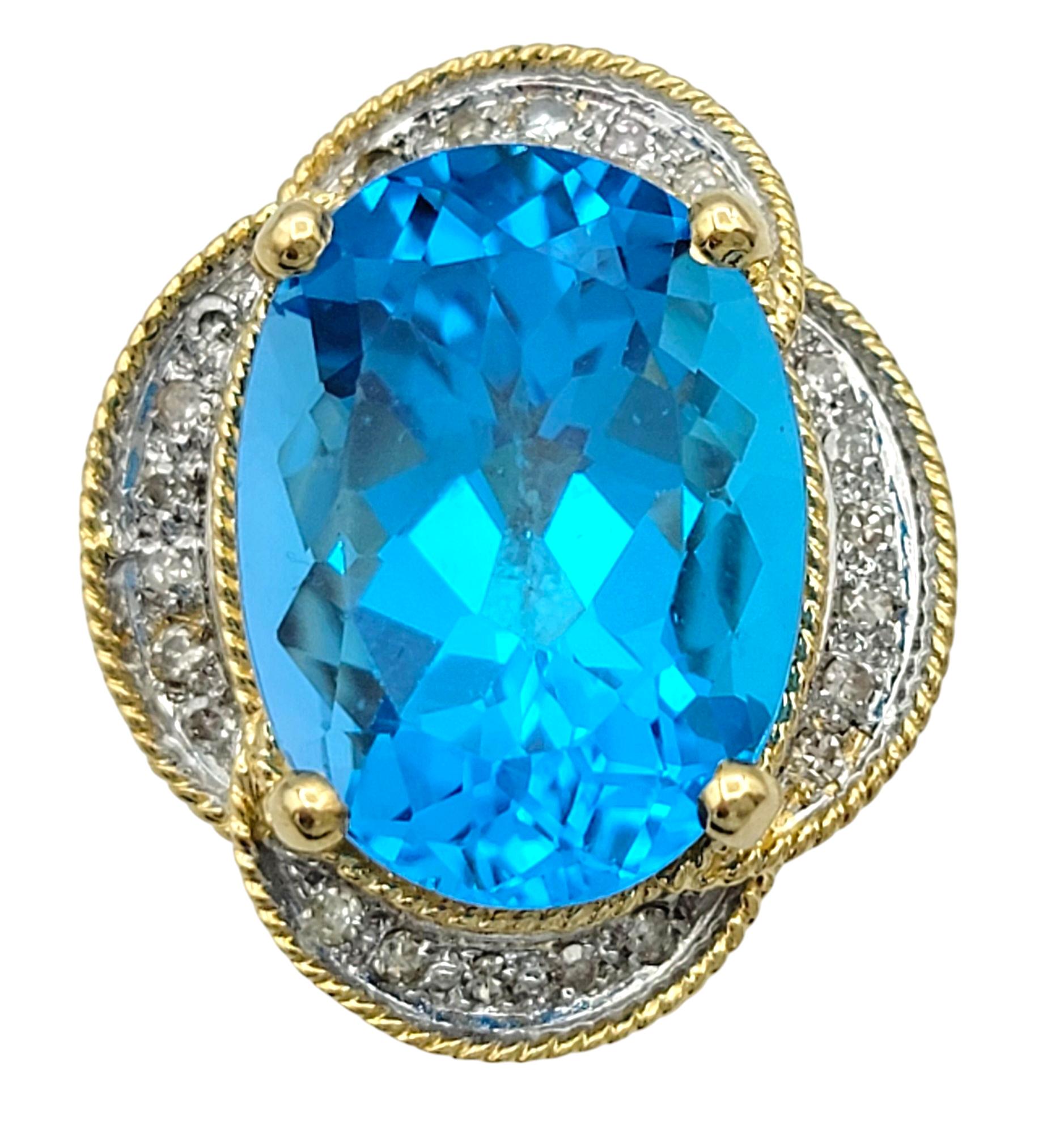 Bold and breathtaking, these earrings showcase vibrant oval-cut blue topaz gemstones set in rich 14 karat yellow gold. The natural topaz stones are saturated with color and beautifully transparent, offering an intense blue hue that commands