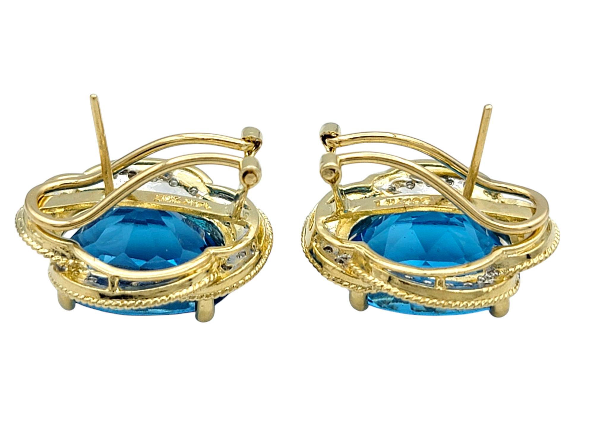 Women's Oval Cut Blue Topaz and Pavé Diamond Omega Back Earrings Two-Tone 14 Karat Gold For Sale