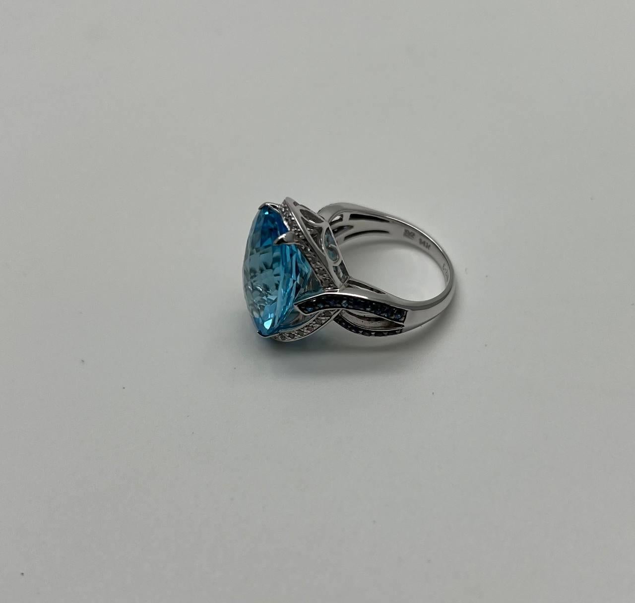 Oval Cut Blue Topaz Intertwining Sapphire Diamond Halo White Gold Statement Ring For Sale 8
