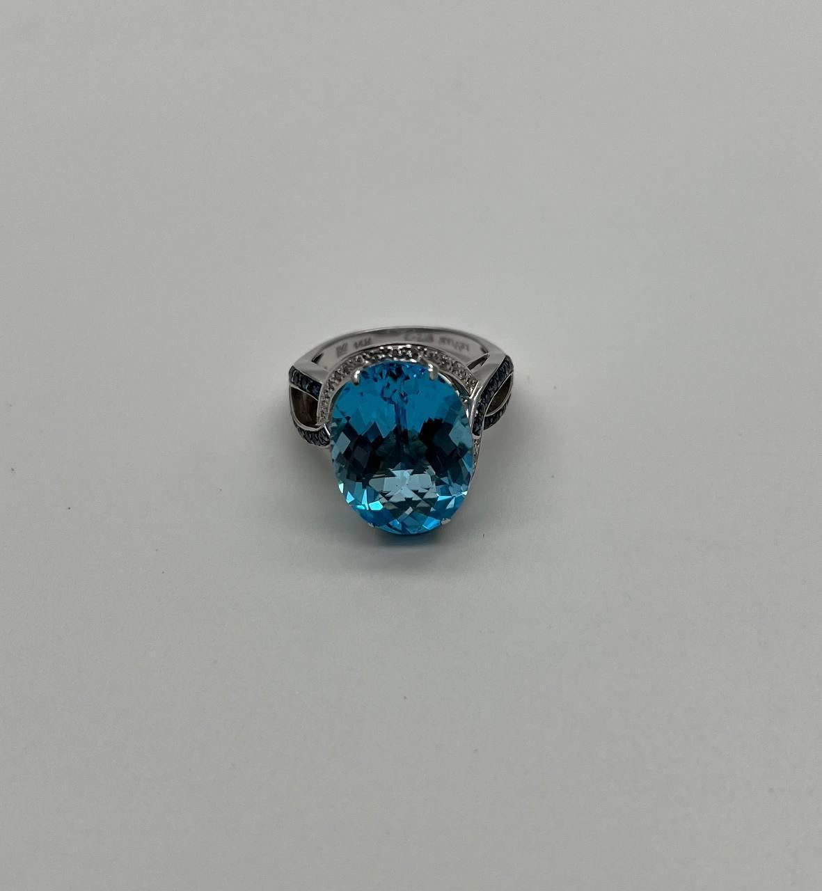 Oval Cut Blue Topaz Intertwining Sapphire Diamond Halo White Gold Statement Ring For Sale 4