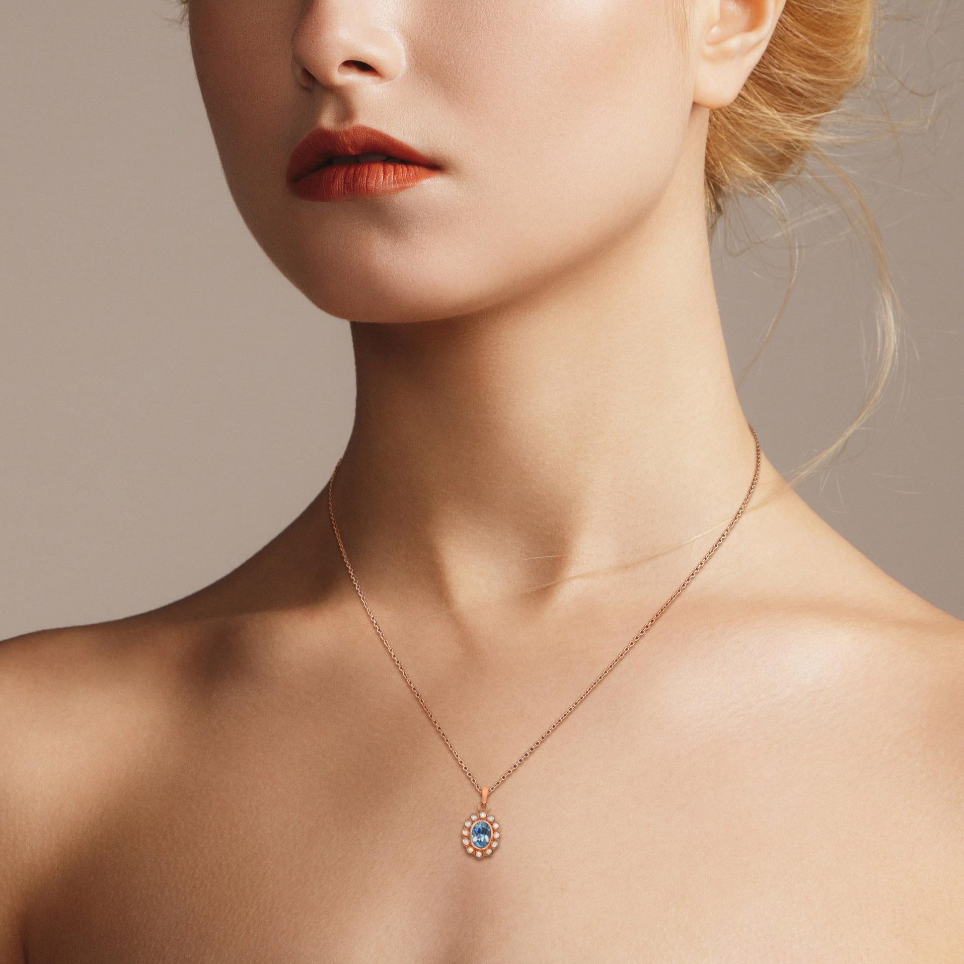 Women's Oval Cut Blue Topaz with Pearl Halo Set Vintage Style 14K Rose Gold Pendant For Sale