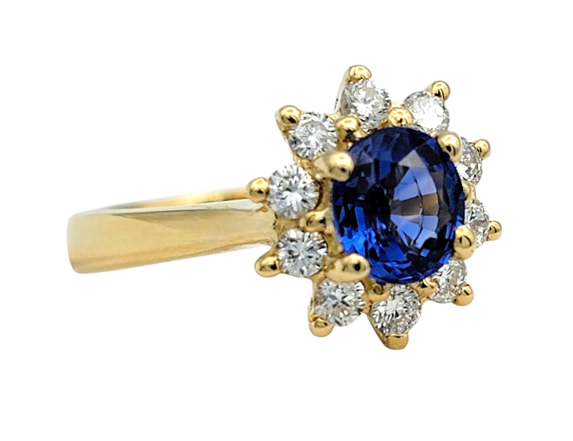 Ring Size: 6

This stunning ring is a masterpiece of timeless elegance and vibrant beauty. At its center lies a vivid blue oval Ceylon sapphire, exuding a deep and captivating hue that commands attention. Surrounding the sapphire is a delicate halo