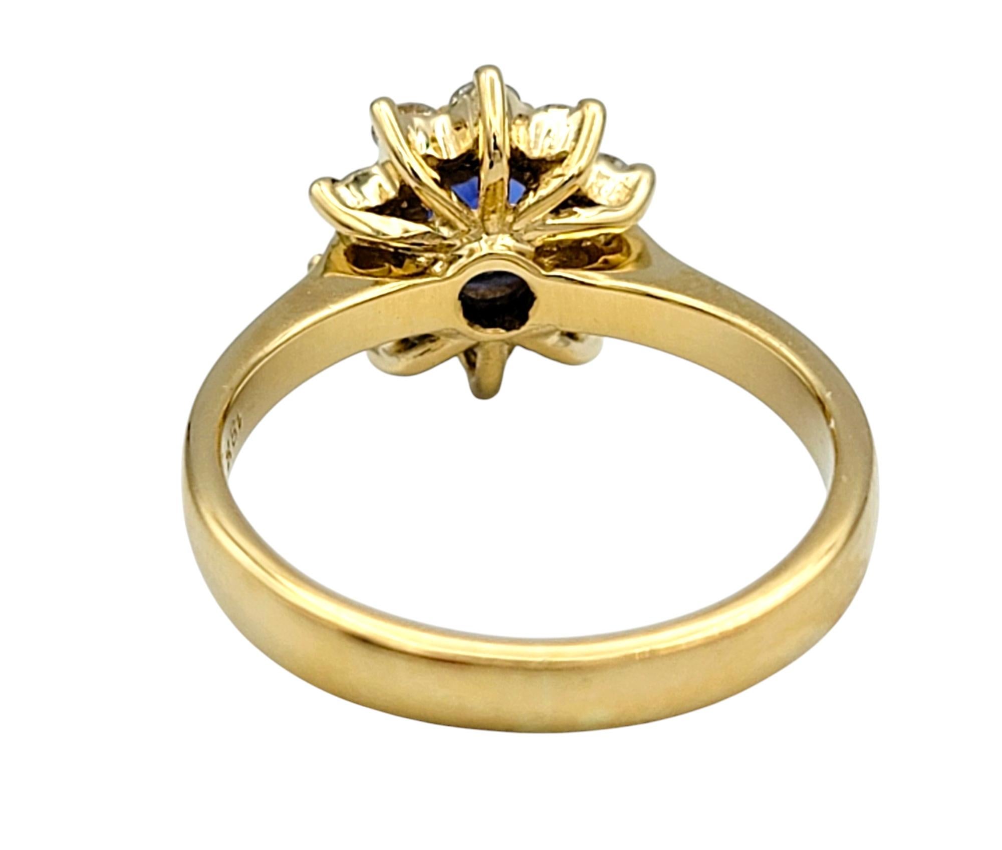 Oval Cut Ceylon Sapphire and Diamond Halo Ring in Polished 18 Karat Yellow Gold In Good Condition For Sale In Scottsdale, AZ