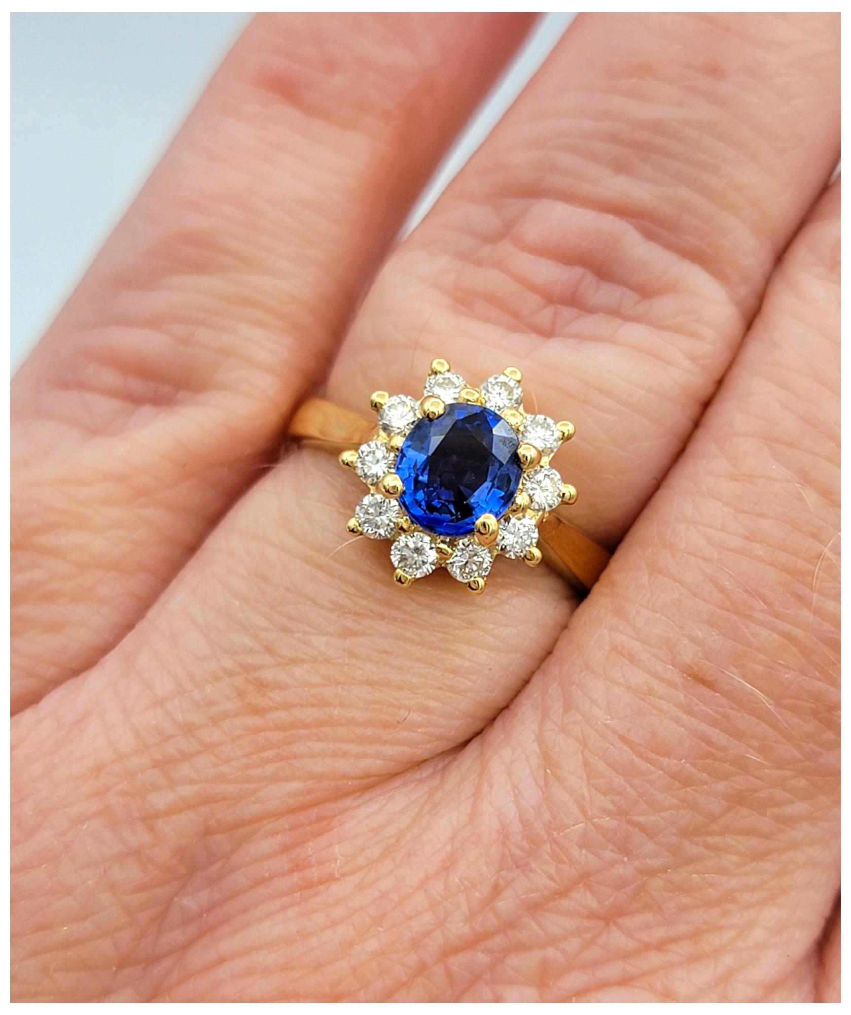 Oval Cut Ceylon Sapphire and Diamond Halo Ring in Polished 18 Karat Yellow Gold For Sale 2
