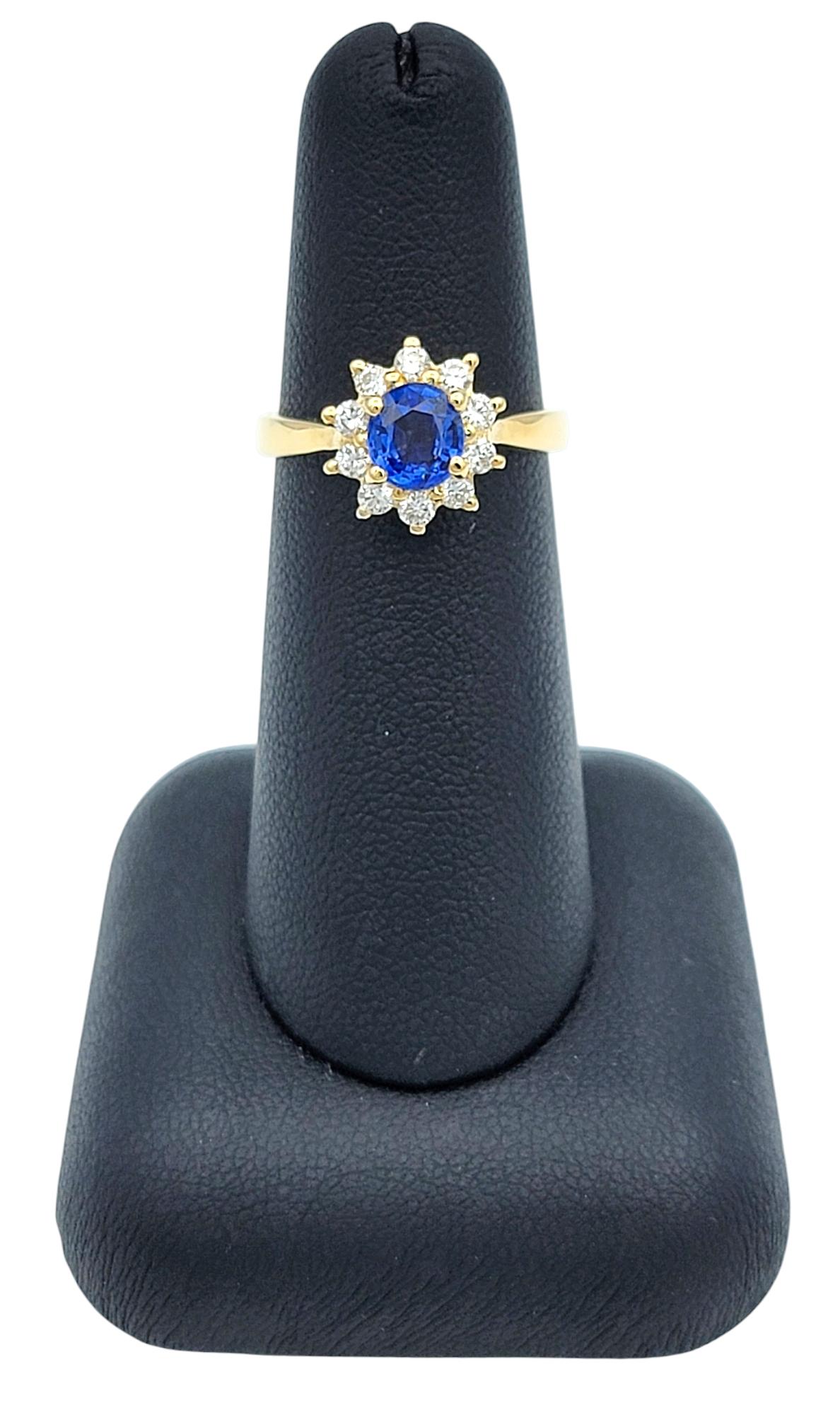 Oval Cut Ceylon Sapphire and Diamond Halo Ring in Polished 18 Karat Yellow Gold For Sale 3