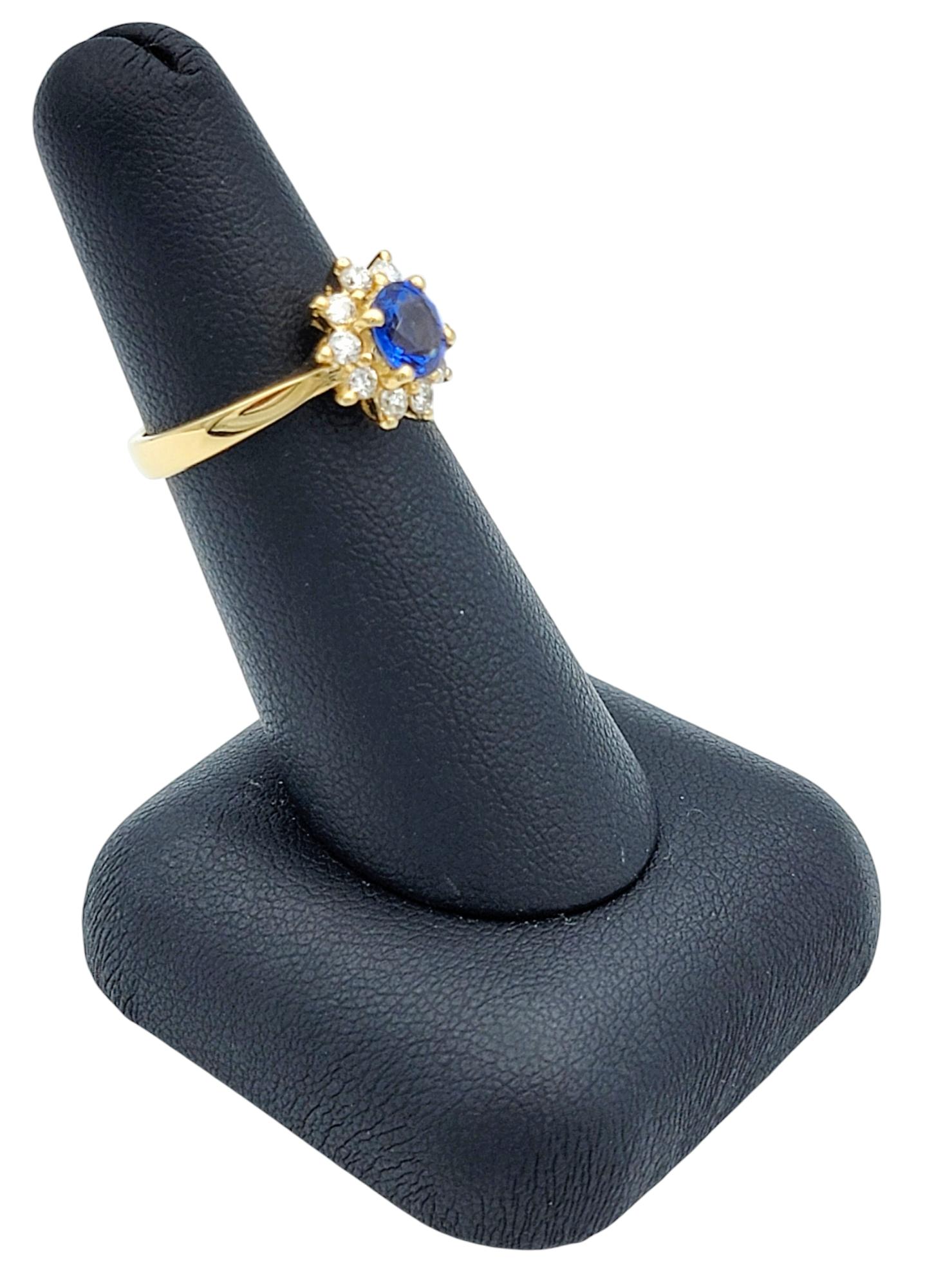 Oval Cut Ceylon Sapphire and Diamond Halo Ring in Polished 18 Karat Yellow Gold For Sale 4