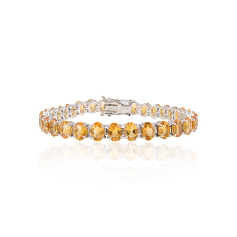 Oval Cut Citrine Gemstone Tennis Bracelet in sterling silver showcases endlessly sparkling natural citrine It measures 7 inches long in length. 
Citrine stimulate concentration and reduces stress. 
Designed with perfect oval cut citrine set in