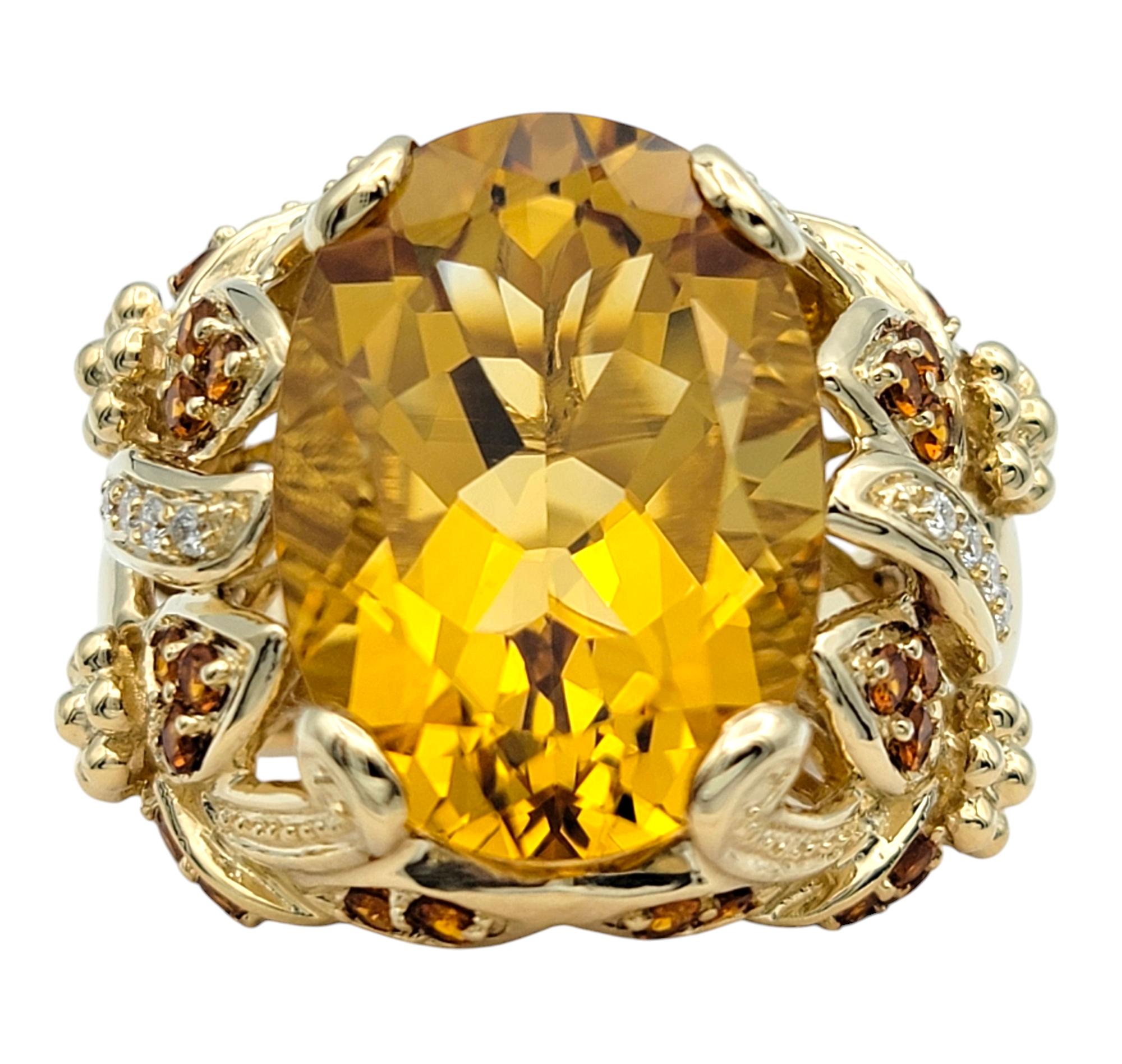 Ring Size: 6.5 

Radiate confidence and charm with this captivating citrine and diamond cocktail ring, a true showstopper of bold elegance. At its heart, a dazzling oval-cut citrine glows with a warm orangey-yellow hue, evoking the vibrant