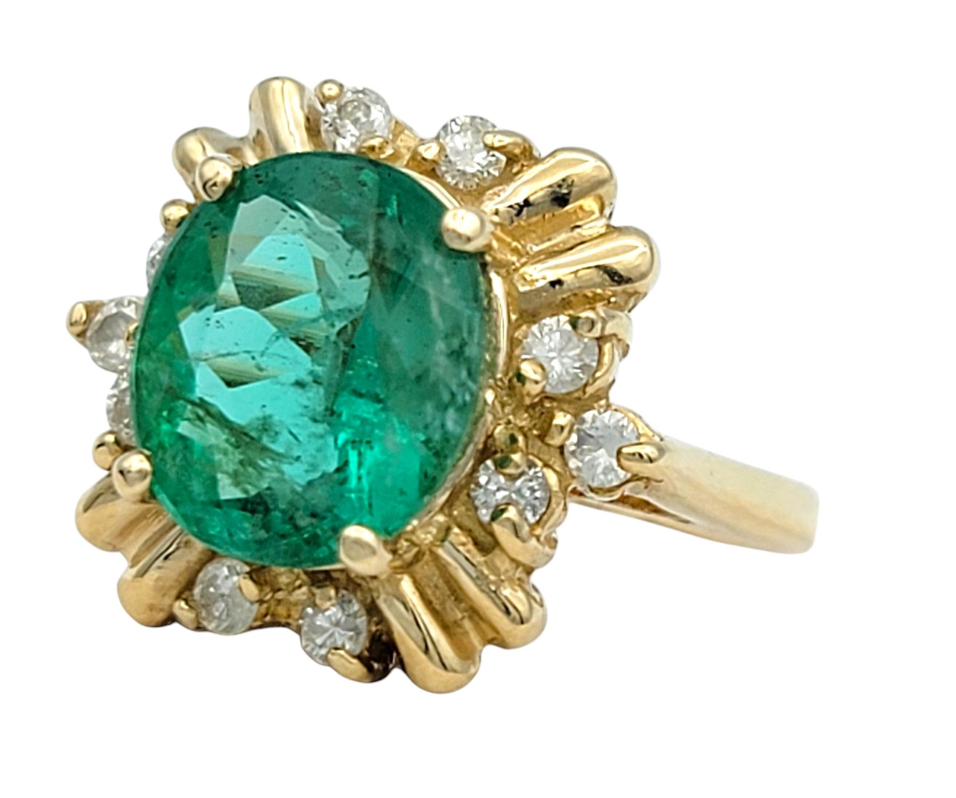 Ring Size: 5

This exquisite Colombian emerald and diamond ring is a masterpiece of elegance and timeless design. At its heart lies a vibrant oval-cut emerald, boasting a rich green hue that captures the natural beauty of its Colombian origins.