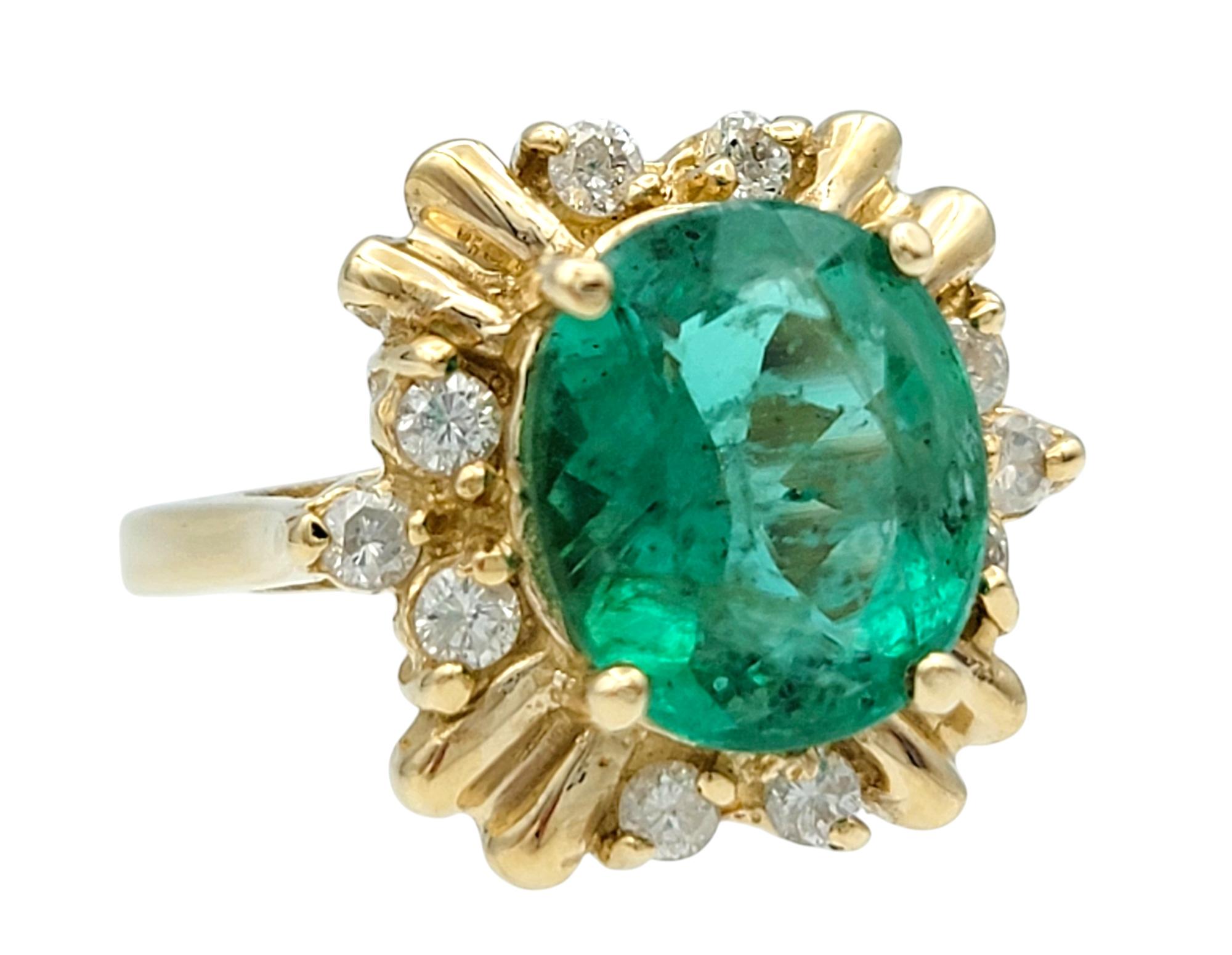 Contemporary Oval Cut Colombian Emerald and Diamond Cocktail Ring in 14 Karat Yellow Gold For Sale