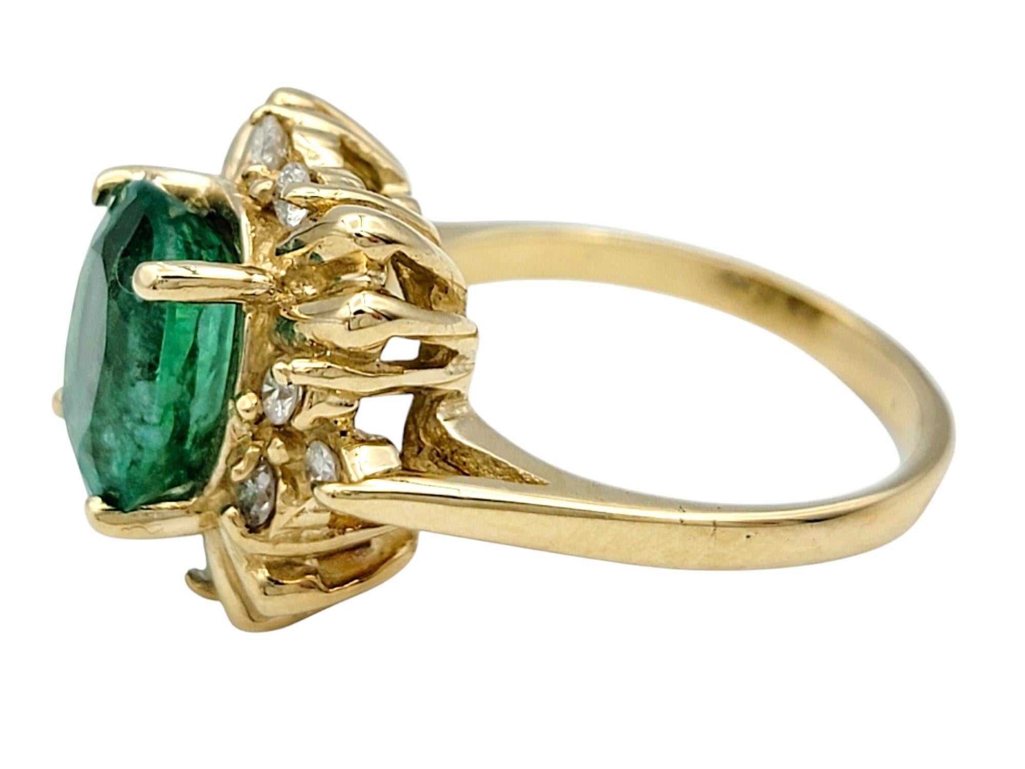 Oval Cut Colombian Emerald and Diamond Cocktail Ring in 14 Karat Yellow Gold In Good Condition For Sale In Scottsdale, AZ