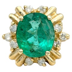 Oval Cut Colombian Emerald and Diamond Cocktail Ring in 14 Karat Yellow Gold