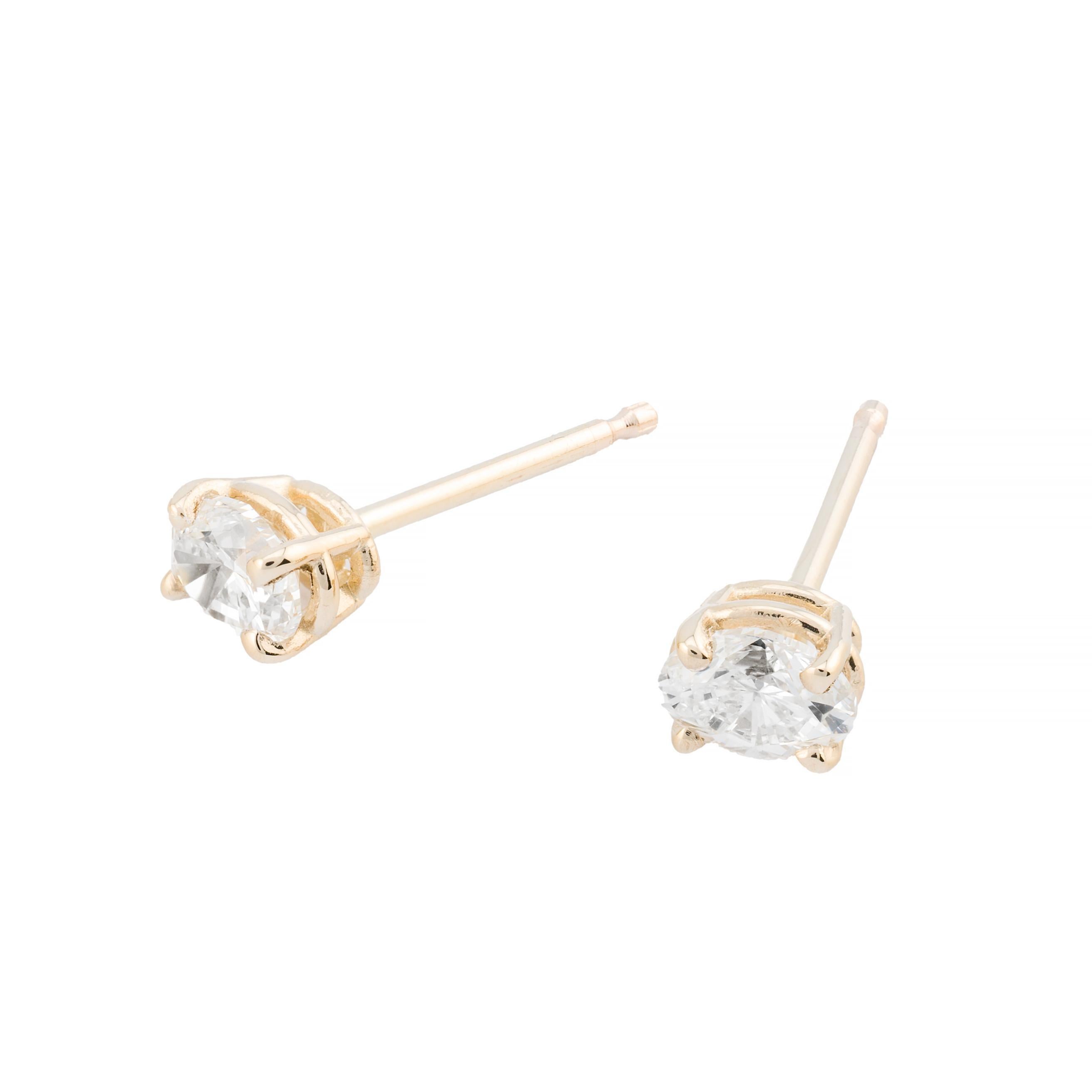 Taille ovale Clous d'oreilles en or jaune 14 carats avec diamants taille ovale de 0,40 carat en vente