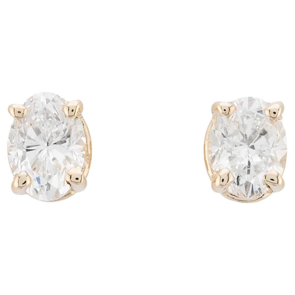 Oval Cut Diamond 0.40ctw Stud Earrings in 14K Yellow Gold