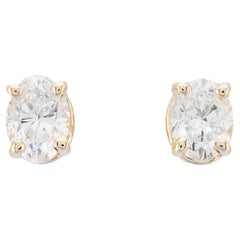 Oval Cut Diamond 0.40ctw Stud Earrings in 14K Yellow Gold