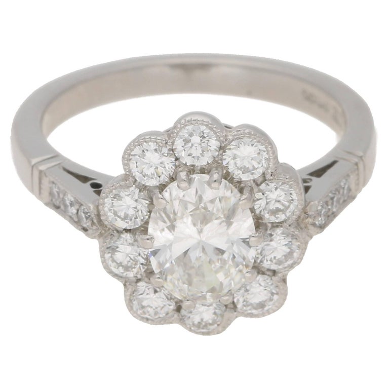 Oval Cut Diamond Cluster Engagement Ring For Sale at 1stdibs