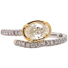 Oval Cut Diamond Crossover Ring 0.94 Carat 14 Karat White and Yellow Gold