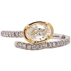 Oval Cut Diamond Crossover Ring 1.25 Carat 14 Karat White and Yellow Gold