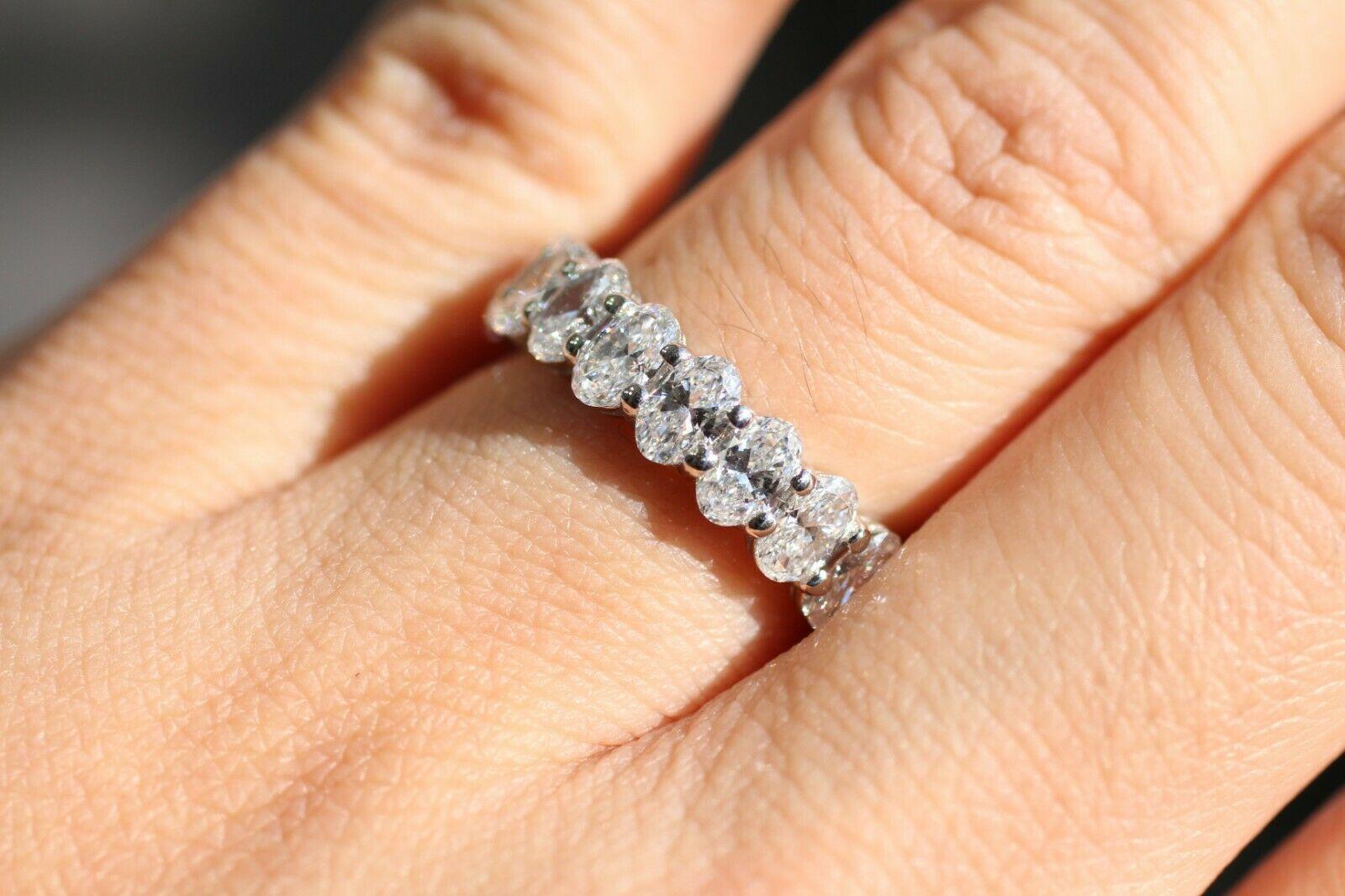 Oval Cut Diamond Eternity Ring with 3.70 Carat Total Weight in Platinum In New Condition In Los Angeles, CA