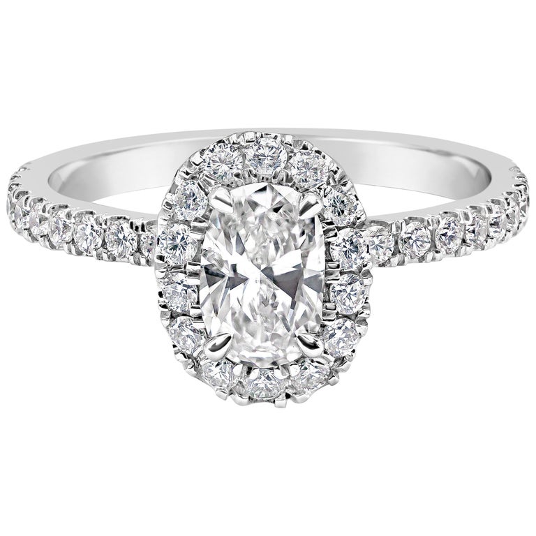 Oval Cut Diamond Halo Engagement Ring For Sale at 1stdibs