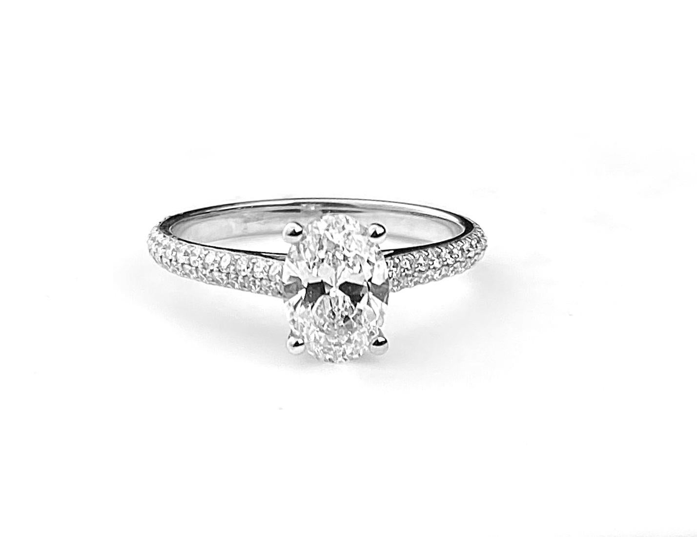 Oval Cut Diamond Solitaire Engagement Ring with Pavé Set Diamond Band For Sale 2