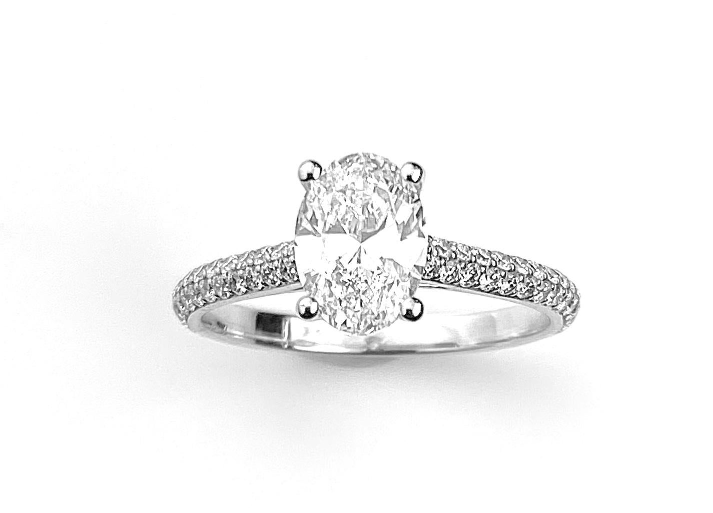 Women's Oval Cut Diamond Solitaire Engagement Ring with Pavé Set Diamond Band For Sale