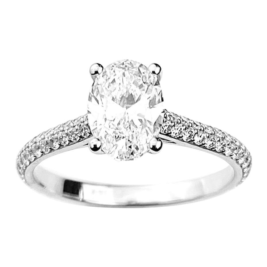 Oval Cut Diamond Solitaire Engagement Ring with Pavé Set Diamond Band For Sale