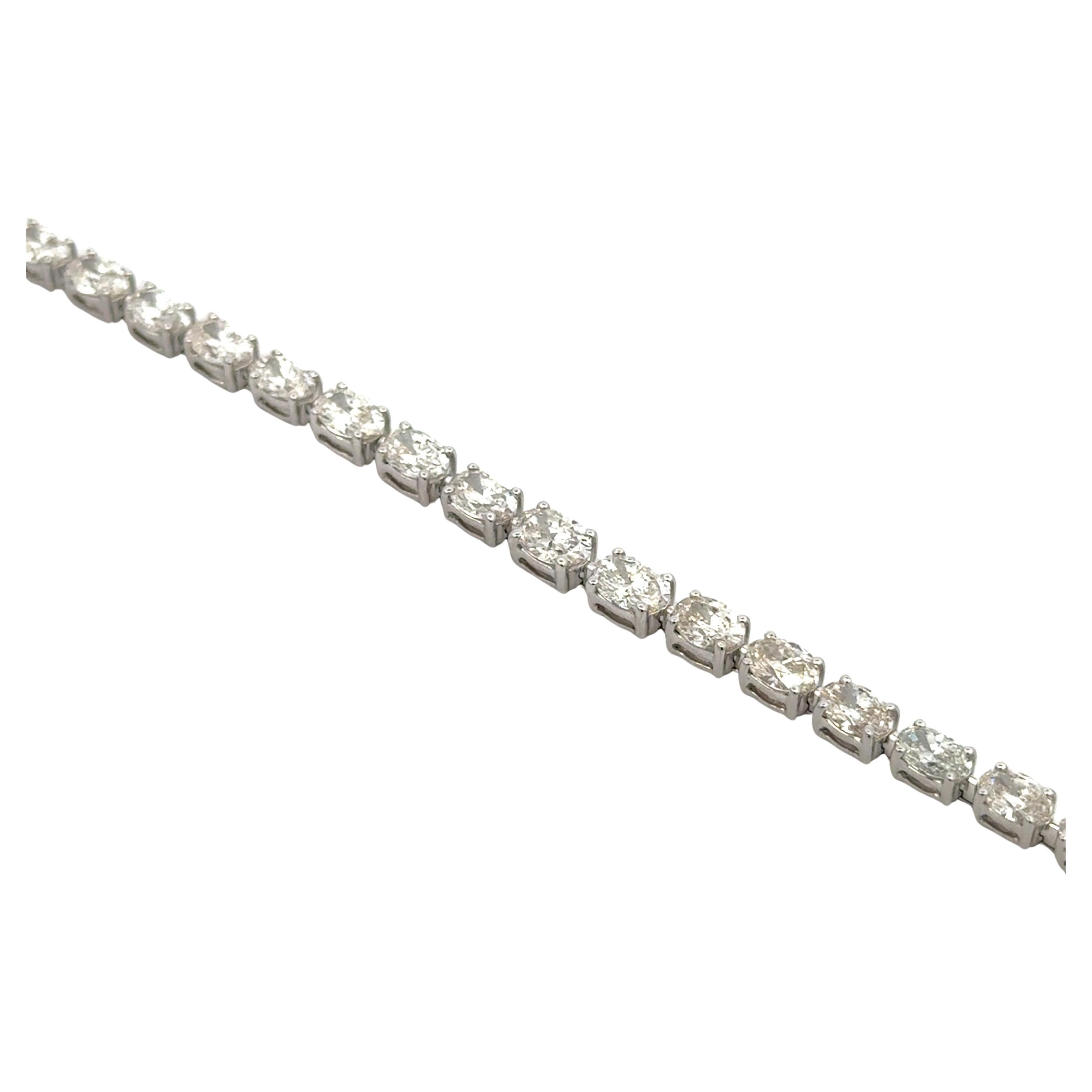 14 Karat white gold tennis bracelet featuring 34 Oval cut diamonds weighing 6.62 carats, average stones 0.195 points.
Color H-I
Clarity VS2-SI1

More different shape tennis bracelets in stock. 
Message for pictures and pricing. 